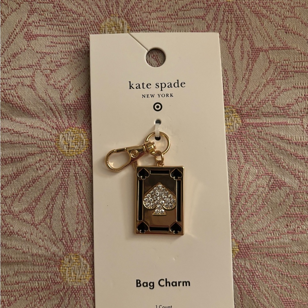 Kate Spade x Target golden and black bag charm with glittery 💎♠️ spade center